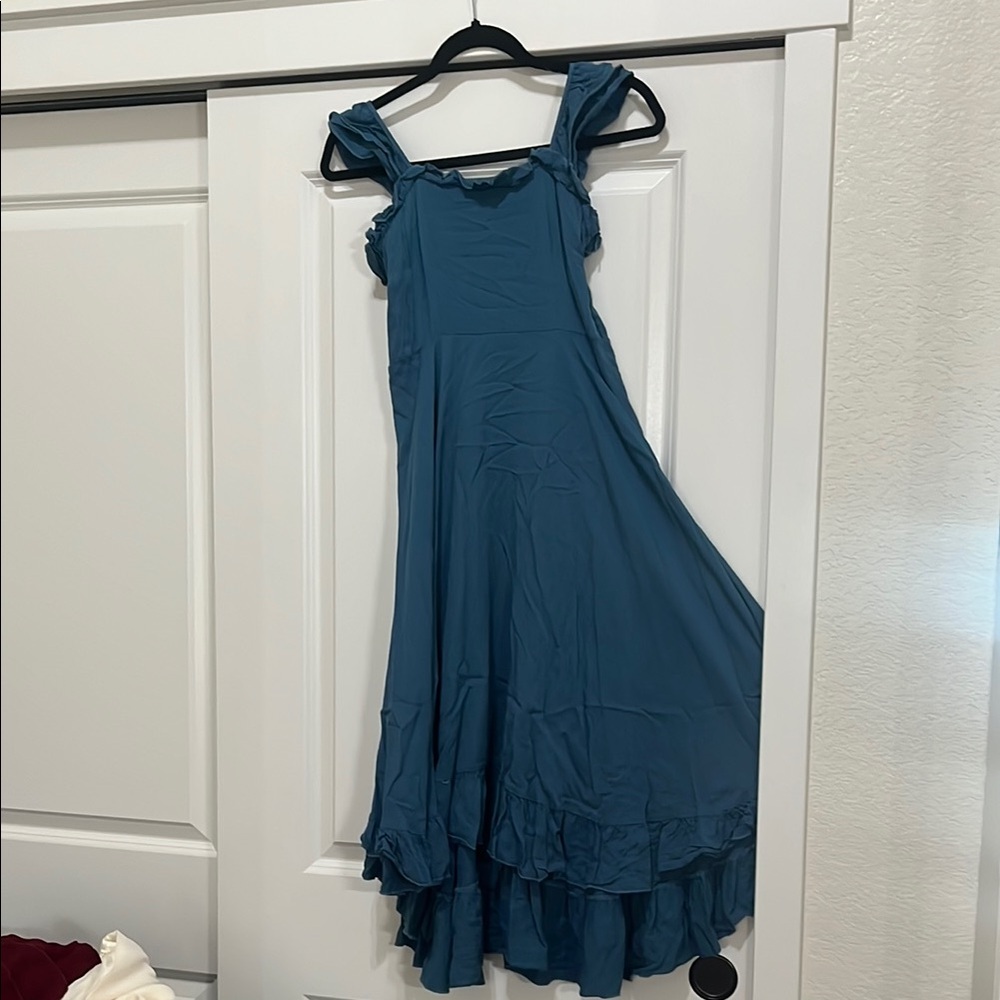 Elegant Blue Sleeveless Dress
Pictures do not do this dress justice!
So cute!